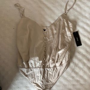 Lulu’s silk cream body suit